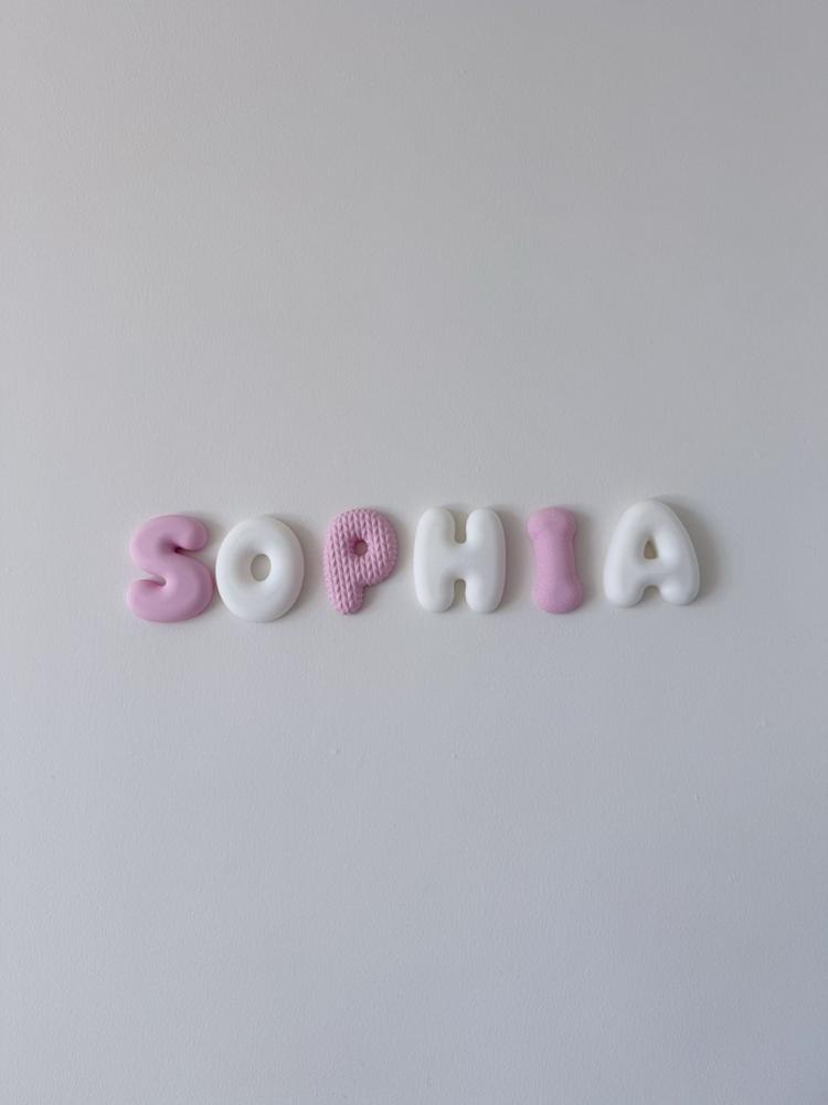 Pink and white SOPHIA letters